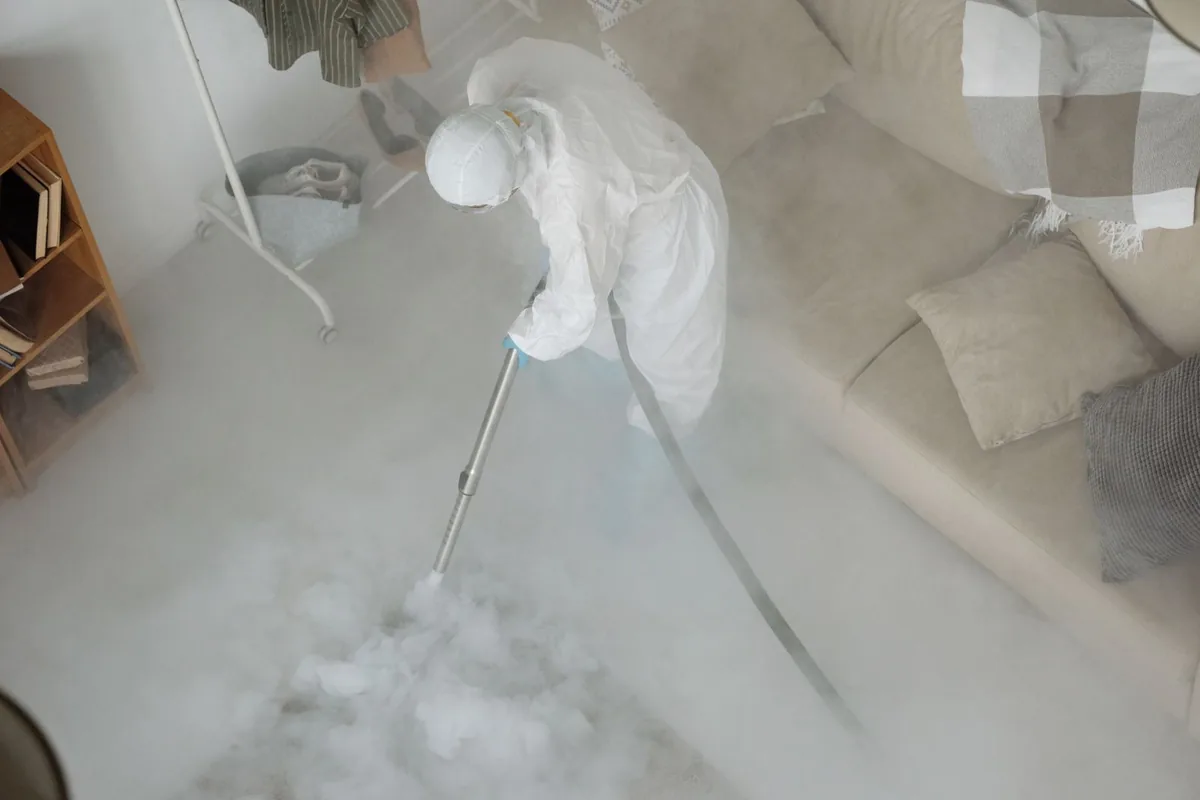 Biohazard cleanup technician in protective equipment, Fredericksburg, VA